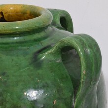 Glazed earthenware walnut oil jug, France circa 1850-1900