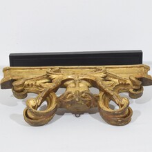 Carved giltwood ornament with winged angel head, France circa 1900