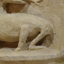 Medieval carved stone fragment depicting a dragon/mythical figure, France circa 1250-1450