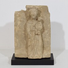 Medieval carved stone panel depicting a Madonna with child, France before 1600