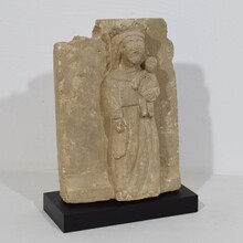 Medieval carved stone panel depicting a Madonna with child, France before 1600