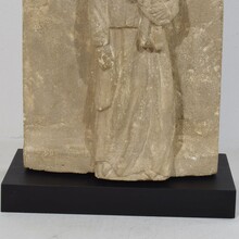 Medieval carved stone panel depicting a Madonna with child, France before 1600