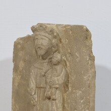 Medieval carved stone panel depicting a Madonna with child, France before 1600