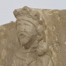 Medieval carved stone panel depicting a Madonna with child, France before 1600