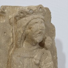 Medieval carved stone panel depicting a Madonna with child, France before 1600