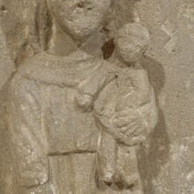 Medieval carved stone panel depicting a Madonna with child, France before 1600