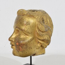 Carved giltwood baroque angel head, Italy circa 1650-1750