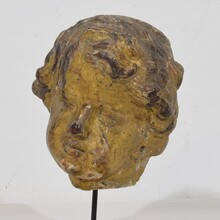 Carved giltwood baroque angel head, Italy circa 1650-1750