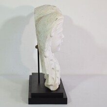 Carved white marble winged angel head, Italy circa 1650-1750