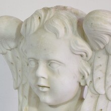 Carved white marble winged angel head, Italy circa 1650-1750