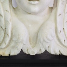 Carved white marble winged angel head, Italy circa 1650-1750