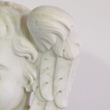 Carved white marble winged angel head, Italy circa 1650-1750