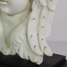 Carved white marble winged angel head, Italy circa 1650-1750