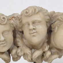 Carved white marble winged angel heads ornaments, Italy circa 1650-1750