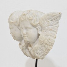 Carved white marble winged double angle head ornament, Italy circa 1750