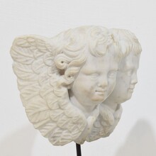 Carved white marble winged double angle head ornament, Italy circa 1750