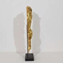 Large hand carved giltwood baroque curl ornament with angel, Italy circa 1750