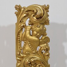 Large hand carved giltwood baroque curl ornament with angel, Italy circa 1750