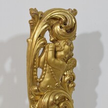 Large hand carved giltwood baroque curl ornament with angel, Italy circa 1750