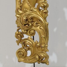 Large hand carved giltwood baroque curl ornament with angel, Italy circa 1750