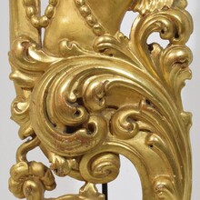 Large hand carved giltwood baroque curl ornament with angel, Italy circa 1750