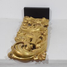 Large hand carved giltwood baroque curl ornament with angel, Italy circa 1750