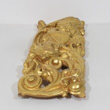 Large hand carved giltwood baroque curl ornament with angel, Italy circa 1750