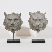 Pair zinc mythical lion-wolf head fragments, France circa 1850-1900