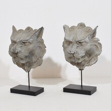 Pair zinc mythical lion-wolf head fragments, France circa 1850-1900