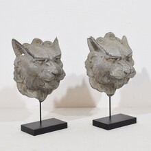 Pair zinc mythical lion-wolf head fragments, France circa 1850-1900