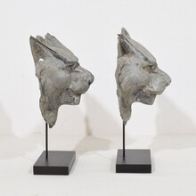 Pair zinc mythical lion-wolf head fragments, France circa 1850-1900