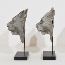 Pair zinc mythical lion-wolf head fragments, France circa 1850-1900