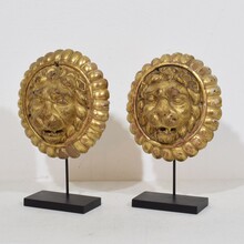 Pair Neoclassical giltwood lion head medaillons, France circa 1780