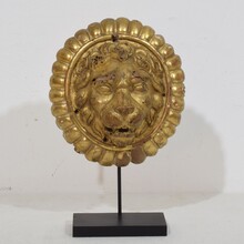 Pair Neoclassical giltwood lion head medaillons, France circa 1780