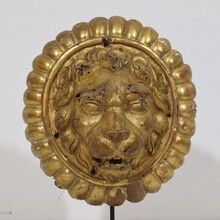 Pair Neoclassical giltwood lion head medaillons, France circa 1780