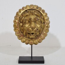 Pair Neoclassical giltwood lion head medaillons, France circa 1780