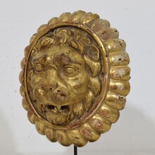 Pair Neoclassical giltwood lion head medaillons, France circa 1780