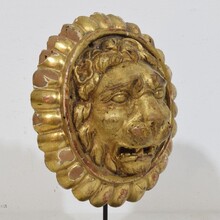 Pair Neoclassical giltwood lion head medaillons, France circa 1780