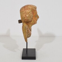 Small baroque carved giltwood angel head on wings, France circa 1750