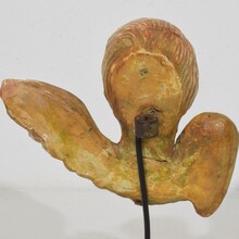Small baroque carved giltwood angel head on wings, France circa 1750