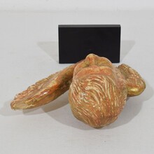 Small baroque carved giltwood angel head on wings, France circa 1750