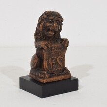 Small hand carved lion sculpture with coat of arms, France circa 1650-1750