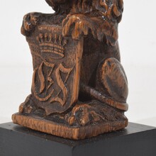 Small hand carved lion sculpture with coat of arms, France circa 1650-1750