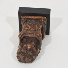 Small hand carved lion sculpture with coat of arms, France circa 1650-1750